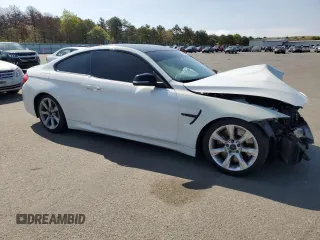 2015 BMW M4 with VIN WBS3R9C52FK333854, listed as a Copart auction lot 55025564 with 0 mi miles and Salvage Title. Bid and sale history available at carsss.com. Image 4.