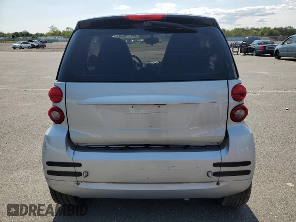 2011 Smart fortwo Pure with VIN WMEEJ3BA6BK449704, listed as a Copart auction lot 69454434 with 23,581 mi miles and Clean title. Bid and sale history available at DreamBid. Image 6.