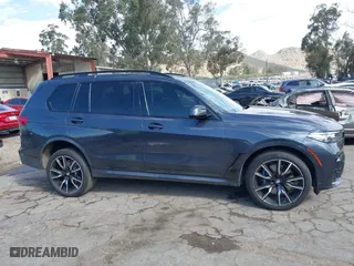 2021 BMW X7 xDrive40i with VIN 5UXCW2C05M9F76009, listed as a IAAI auction lot 41681992 with 48,565 mi miles. Bid and sale history available at carsss.com. Image 13.