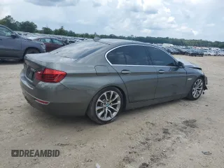 2014 BMW 5 Series 535d with VIN WBAXA5C50ED691107, listed as a Copart auction lot 64393794 with 114,627 mi miles and Salvage Title. Bid and sale history available at DreamBid. Image 3.
