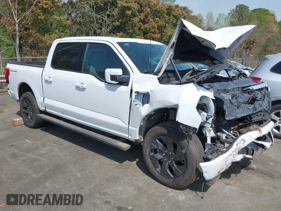 2023 Ford F-150 Lightning Pro z VIN 1FTVW1EV1PWG17610, wystawiony jako IAAI lot #41929636 z przebiegiem 44 428 mil mil oraz . Historia ofert i sprzedaży dostępna na DreamBid. Obrazek 1.