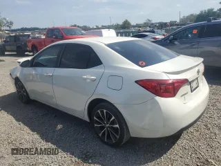 2019 Toyota Corolla L with VIN 5YFBURHE5KP921284, listed as a Copart auction lot 54277235 with 100,935 mi miles and Salvage Title. Bid and sale history available at DreamBid. Image 2.