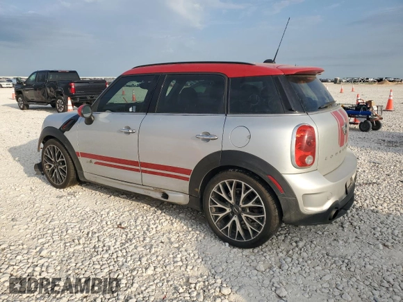 2016 MINI Countryman John Cooper Works with VIN WMWXD1C59GWT97602, listed as a Copart auction lot 52898605 with 141,749 mi miles and Salvage Title. Bid and sale history available at DreamBid. Image 2.