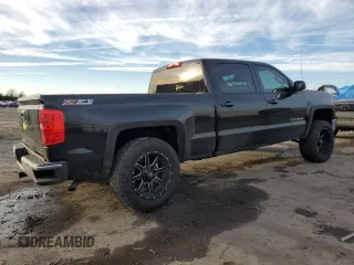 2015 Chevrolet Silverado 1500 LT with VIN 3GCUKREC9FG142578, listed as a Copart auction lot 44142905 with 194,369 mi miles and Salvage Title. Bid and sale history available at DreamBid. Image 3.
