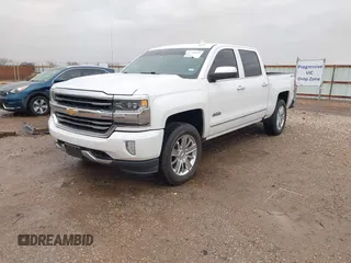 2018 Chevrolet Silverado 1500 High Country with VIN 3GCUKTEC1JG331991, listed as a IAAI auction lot 41718084 with 120,924 mi miles and . Bid and sale history available at DreamBid. Image 2.