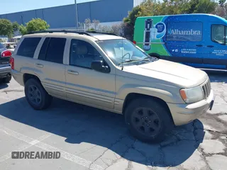 2000 Jeep Grand Cherokee Laredo with VIN 1J4G258S5YC237373, listed as a IAAI auction lot 42736569 with 103,310 mi miles and . Bid and sale history available at DreamBid. Image 1.