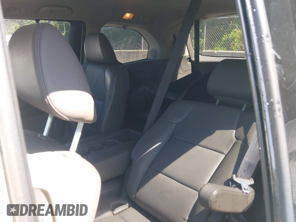 2014 Honda Odyssey Touring with VIN 5FNRL5H94EB071788, listed as a IAAI auction lot 42523959 with 244,734 mi miles and . Bid and sale history available at DreamBid. Image 8.
