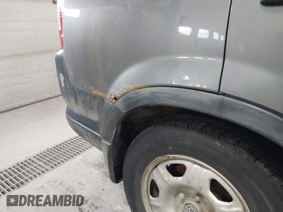 2006 Honda CR-V LX with VIN JHLRD785X6C053853, listed as a IAAI auction lot 42018895 with 246,316 mi miles and . Bid and sale history available at carsss.com. Image 13.