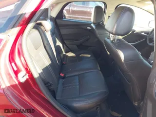 2014 Ford Focus Titanium with VIN 1FADP3J23EL137525, listed as a IAAI auction lot 41562684 with 127,104 mi miles. Bid and sale history available at carsss.com. Image 8.