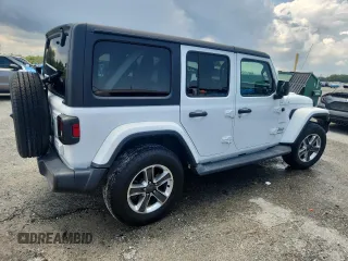 2020 Jeep Wrangler Unlimited Sahara with VIN 1C4HJXEN7LW165137, listed as a Copart auction lot 64458345 with 82,553 mi miles and Salvage title. Bid and sale history available at DreamBid. Image 3.