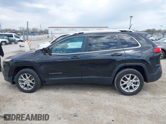 2014 Jeep Cherokee Latitude with VIN 1C4PJLCB6EW186576, listed as a IAAI auction lot 42099422 with 117,681 mi miles and . Bid and sale history available at DreamBid. Image 15.