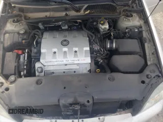 2003 Cadillac DeVille DTS z VIN 1G6KF57973U163124, wystawiony jako Copart lot #78054584 z przebiegiem 111 189 mil mil oraz Szkoda całkowita • Salvage title. Historia ofert i sprzedaży dostępna na DreamBid. Obrazek 11.