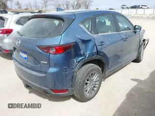 2018 Mazda CX-5 Sport with VIN JM3KFBBM8J0400741, listed as a IAAI auction lot 41860323 with 54,911 mi miles. Bid and sale history available at carsss.com. Image 4.