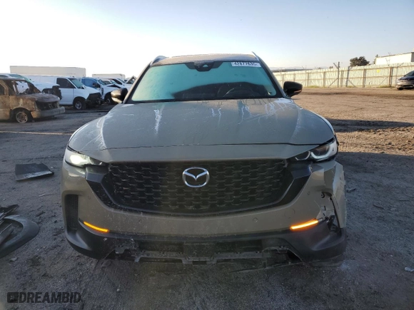 2023 Mazda CX-50 2.5 Turbo Premium Plus Package with VIN 7MMVABEY3PN101558, listed as a Copart auction lot 42877635 with 52,778 mi miles and Salvage Title. Bid and sale history available at carsss.com. Image 5.