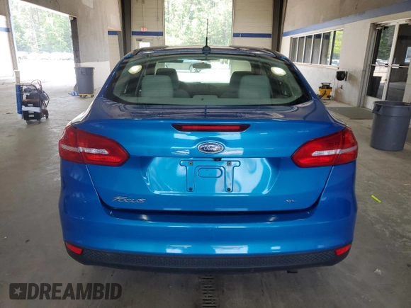 2015 Ford Focus SE with VIN 1FADP3F27FL329928, listed as a Copart auction lot 60795595 with 120,277 mi miles and Clean title. Bid and sale history available at DreamBid. Image 6.