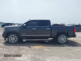 2014 GMC Sierra 1500 Denali with VIN 3GTU2WEC3EG390936, listed as a IAAI auction lot 42253577 with 196,852 mi miles and . Bid and sale history available at DreamBid. Image 14.