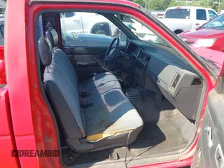 1993 Nissan Frontier with VIN 1N6SD11S6PC423836, listed as a IAAI auction lot 42418573 with 211,471 mi miles and . Bid and sale history available at DreamBid. Image 5.