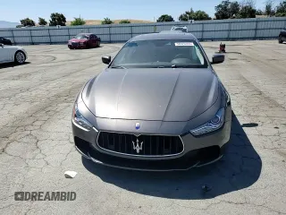 2016 Maserati Ghibli S with VIN ZAM57RSA3G1169053, listed as a Copart auction lot 58970355 with 73,843 mi miles and Salvage title. Bid and sale history available at DreamBid. Image 13.
