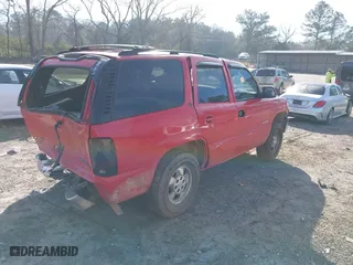 2002 Chevrolet Tahoe LT with VIN 1GNEK13Z12J283366, listed as a IAAI auction lot 41832833 with 350,411 mi miles. Bid and sale history available at carsss.com. Image 4.