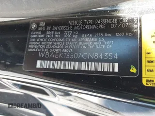 2007 BMW 6 Series 650i with VIN WBAEK13507CN84354, listed as a IAAI auction lot 41604376 with 97,956 mi miles. Bid and sale history available at carsss.com. Image 9.