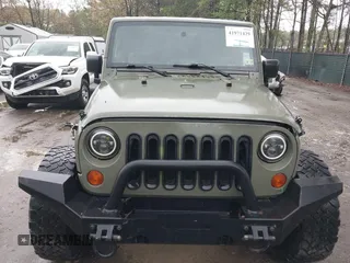 2007 Jeep Wrangler X with VIN 1J4FA24127L231409, listed as a IAAI auction lot 41971429 with 181,855 mi miles and . Bid and sale history available at carsss.com. Image 6.