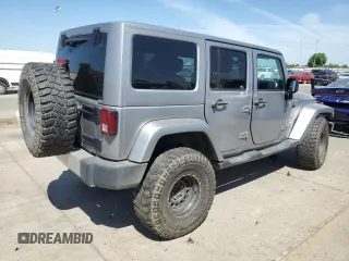 2013 Jeep Wrangler Unlimited Sahara with VIN 1C4BJWEG5DL662756, listed as a Copart auction lot 56423615 with 189,355 mi miles and Salvage title. Bid and sale history available at DreamBid. Image 3.