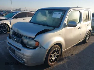 2011 Nissan Cube S z VIN JN8AZ2KR6BT205720, wystawiony jako IAAI lot #41647157 z przebiegiem 154 116 mil mil oraz . Historia ofert i sprzedaży dostępna na DreamBid. Obrazek 2.
