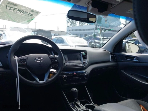 2016 Hyundai Tucson Limited with VIN KM8J33A24GU124543, listed as a IAAI auction lot 41808327 with 38,069 mi miles. Bid and sale history available at carsss.com. Image 22.