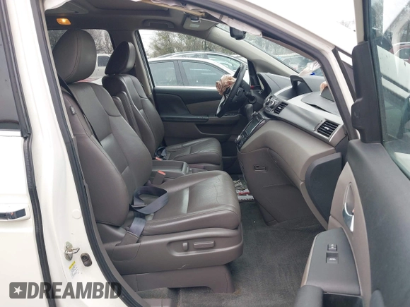 2016 Honda Odyssey Touring Elite with VIN 5FNRL5H9XGB100116, listed as a IAAI auction lot 41543464 with 160,763 mi miles and . Bid and sale history available at DreamBid. Image 5.