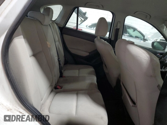 2015 Mazda CX-5 Sport with VIN JM3KE4BY4F0551679, listed as a Copart auction lot 68471374 with 198,987 mi miles and Non Repairable. Bid and sale history available at carsss.com. Image 11.