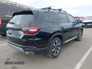 2024 Honda Pilot Touring z VIN 5FNYG1H70RB032368, wystawiony jako IAAI lot #41805758 z przebiegiem 13 078 mil mil oraz . Historia ofert i sprzedaży dostępna na DreamBid. Obrazek 4.