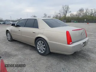 2009 Cadillac DTS w/1SA with VIN 1G6KD57Y29U137410, listed as a IAAI auction lot 42026044 with 112,916 mi miles. Bid and sale history available at carsss.com. Image 3.
