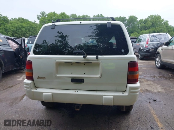 1997 Jeep Grand Cherokee Limited z VIN 1J4GZ78S1VC536295, wystawiony jako IAAI lot #42435292 z przebiegiem 310 005 mil mil oraz . Historia ofert i sprzedaży dostępna na DreamBid. Obrazek 17.