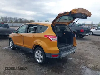 2016 Ford Escape SE with VIN 1FMCU0GX3GUB75572, listed as a IAAI auction lot 41869920 with 154,586 mi miles and . Bid and sale history available at carsss.com. Image 3.