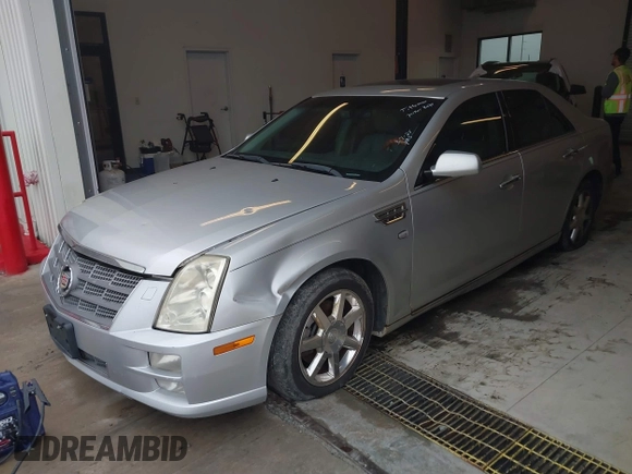 2011 Cadillac STS RWD with VIN 1G6DW6ED4B0120517, listed as a IAAI auction lot 41765069 with 120,059 mi miles and . Bid and sale history available at DreamBid. Image 6.