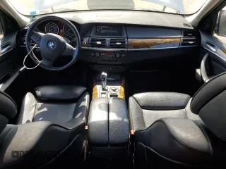 2012 BMW X5 35i with VIN 5UXZV4C5XCL749204, listed as a Copart auction lot 62012985 with 94,636 mi miles and Clean title. Bid and sale history available at DreamBid. Image 8.