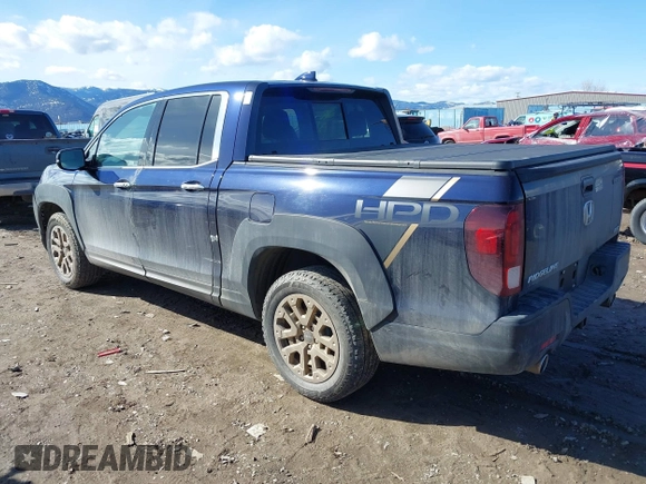 2022 Honda Ridgeline RTL-E with VIN 5FPYK3F71NB013522, listed as a IAAI auction lot 41670347 with 24,689 mi miles and . Bid and sale history available at DreamBid. Image 3.