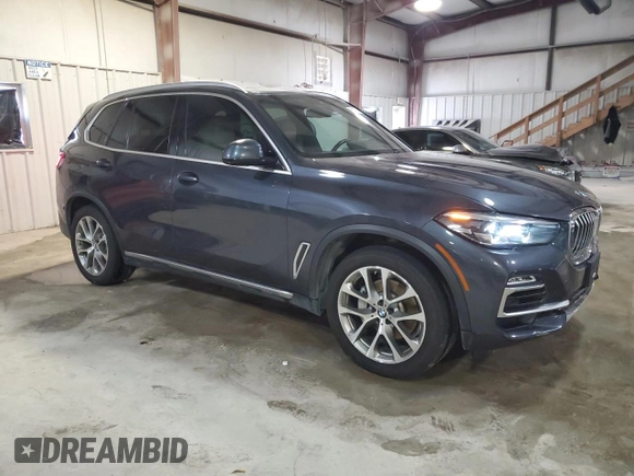 2020 BMW X5 sDrive40i with VIN 5UXCR4C00L9C26093, listed as a Copart auction lot 81833724 with 66,583 mi miles and Clean title. Bid and sale history available at DreamBid. Image 4.