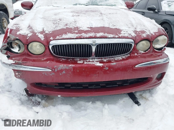 2003 Jaguar X-Type 2.5L Manual z VIN SAJEA51D63XC89273, wystawiony jako IAAI lot #41298544 z przebiegiem 124 400 mil mil oraz . Historia ofert i sprzedaży dostępna na DreamBid. Obrazek 18.