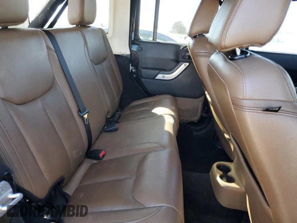 2014 Jeep Wrangler Unlimited Rubicon X with VIN 1C4HJWFG8EL119654, listed as a Copart auction lot 46699055 with 148,412 mi miles and Salvage title. Bid and sale history available at DreamBid. Image 11.