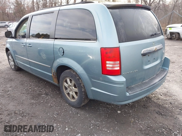 2010 Chrysler Town & Country Touring with VIN 2A4RR5D15AR415362, listed as a IAAI auction lot 41989057 with 133,406 mi miles and . Bid and sale history available at DreamBid. Image 3.