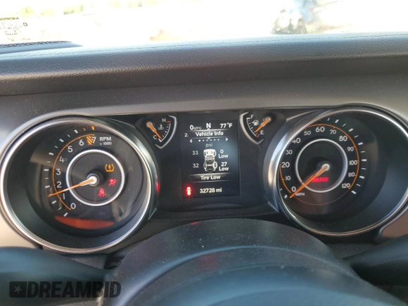 2021 Jeep Wrangler Sport with VIN 1C4GJXAG2MW767559, listed as a Copart auction lot 82108354 with 32,728 mi miles and Salvage Title. Bid and sale history available at DreamBid. Image 9.