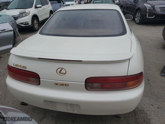 1996 Lexus SC 400 with VIN JT8CH32YXT0050319, listed as a Copart auction lot 74710894 with NaN miles and Salvage Title. Bid and sale history available at carsss.com. Image 6.