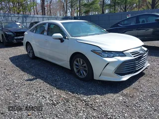 2019 Toyota Avalon XLE z VIN 4T1BZ1FB4KU037024, wystawiony jako IAAI lot #41943473 z przebiegiem 72 739 mil mil oraz . Historia ofert i sprzedaży dostępna na DreamBid. Obrazek 1.