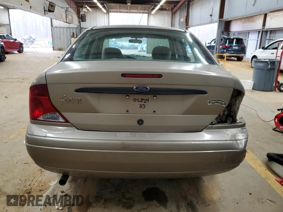 2003 Ford Focus LX with VIN 1FAFP33P63W257719, listed as a Copart auction lot 83937554 with 75,967 mi miles and Salvage Title. Bid and sale history available at carsss.com. Image 6.