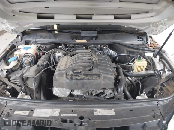 2013 Volkswagen Touareg Lux with VIN WVGEF9BP6DD007323, listed as a IAAI auction lot 41488959 with 123,383 mi miles and . Bid and sale history available at DreamBid. Image 10.