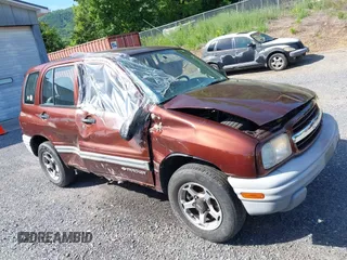 2000 Chevrolet Tracker z VIN 2CNBJ13C3Y6917675, wystawiony jako IAAI lot #42281654 z przebiegiem 153 805 mil mil oraz . Historia ofert i sprzedaży dostępna na DreamBid. Obrazek 6.