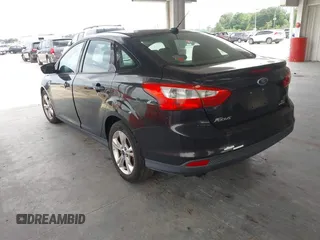2013 Ford Focus SE z VIN 1FADP3F27DL343387, wystawiony jako IAAI lot #42409706 z przebiegiem 139 164 mil mil oraz . Historia ofert i sprzedaży dostępna na DreamBid. Obrazek 3.