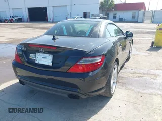 2013 Mercedes-Benz SLK-Class SLK 250 with VIN WDDPK4HA5DF059891, listed as a IAAI auction lot 42015777 with 79,255 mi miles. Bid and sale history available at carsss.com. Image 4.