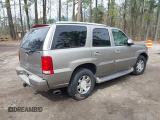 2002 Cadillac Escalade z VIN 1GYEK63N52R236906, wystawiony jako IAAI lot #41877028 z przebiegiem 185 348 mil mil oraz . Historia ofert i sprzedaży dostępna na DreamBid. Obrazek 4.